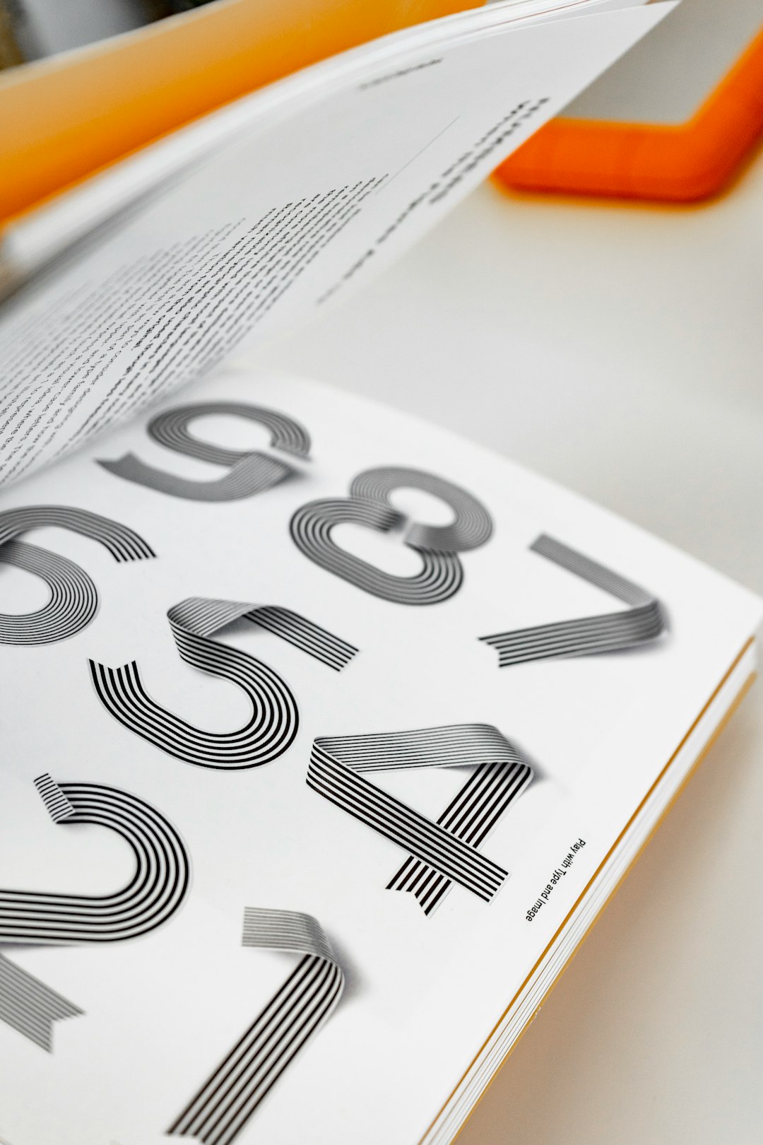 a-close-up-of-a-book-with-numbers-on-it-id5lt7-sydq